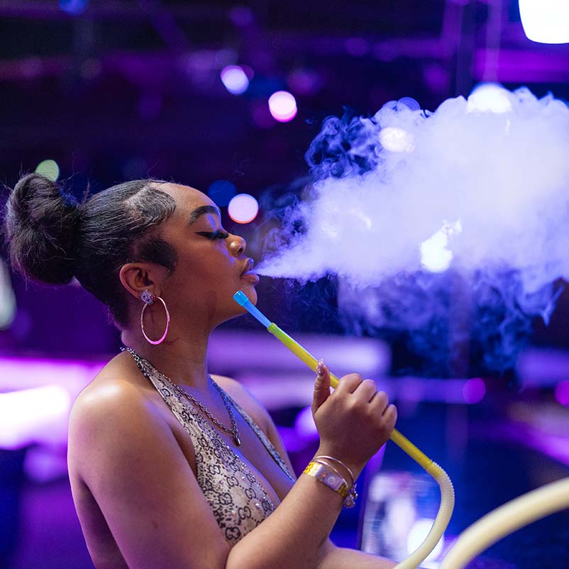 Bartender serving hookah